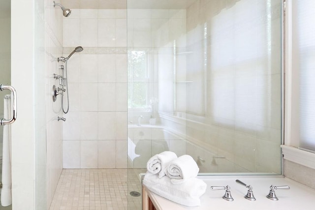 full bathroom featuring vanity and a shower stall