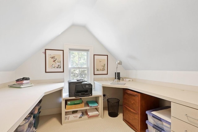 office space featuring light carpet and lofted ceiling