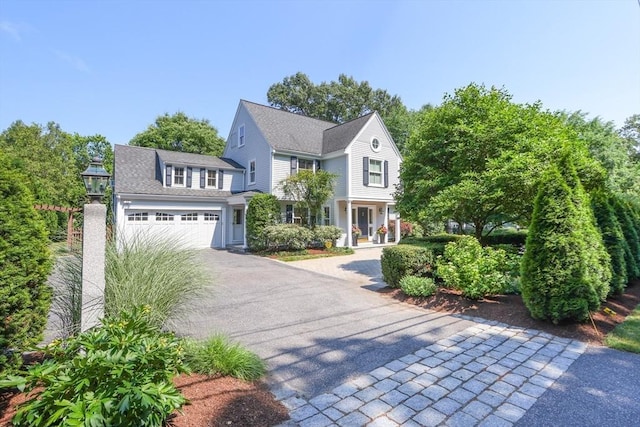 view of front of house featuring driveway and an attached garage