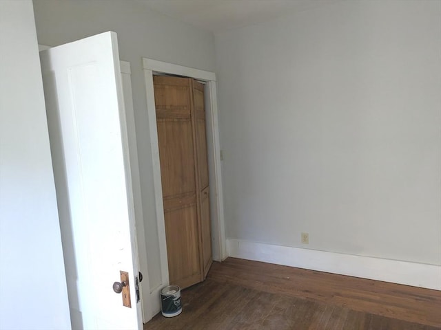 12-14 Essex St, Dover, NH 03820 - unfurnished room with dark wood finished floors and baseboards