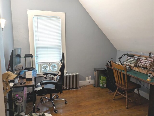 12-14 Essex St, Dover, NH 03820 - office with lofted ceiling, hardwood / wood-style floors, and radiator