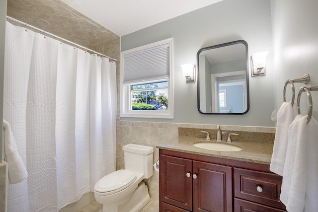 38 Point Allerton Ave, Hull, MA 02045 - bathroom featuring vanity, toilet, tile walls, tile patterned floors, and a shower with shower curtain