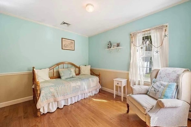 bedroom featuring wood-type flooring