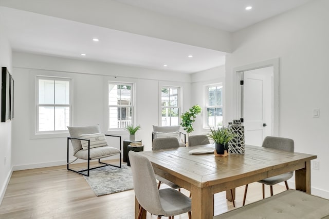 dining room with light wood-type flooring