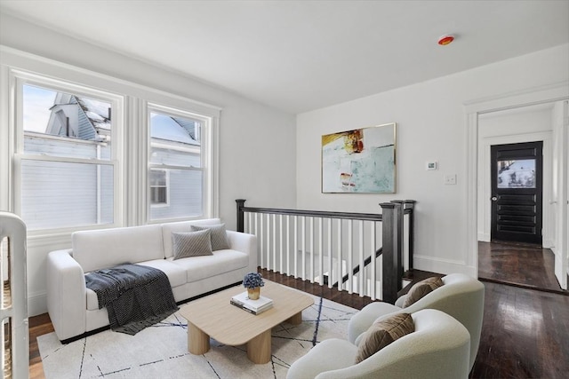 living room with hardwood / wood-style flooring and a wealth of natural light