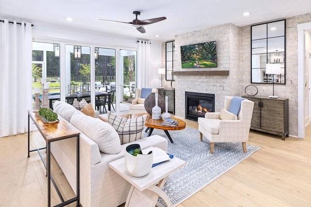 27 Kestrel Hts Unit 76, Plymouth, MA 02360 - living area featuring ceiling fan, a large fireplace, wood finished floors, and recessed lighting