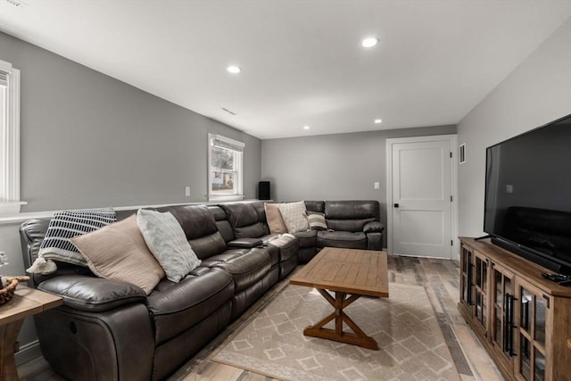 living room featuring recessed lighting and wood finished floors