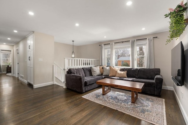 living room featuring visible vents, recessed lighting, dark wood-type flooring, and baseboards