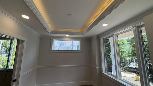 7 Avery St, Needham, MA 02494 - empty room featuring plenty of natural light, ornamental molding, recessed lighting, a tray ceiling, and baseboards