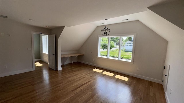 7 Avery St, Needham, MA 02494 - additional living space featuring baseboards, vaulted ceiling, and wood finished floors
