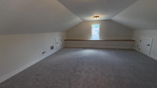 7 Avery St, Needham, MA 02494 - additional living space featuring vaulted ceiling, carpet floors, and baseboards