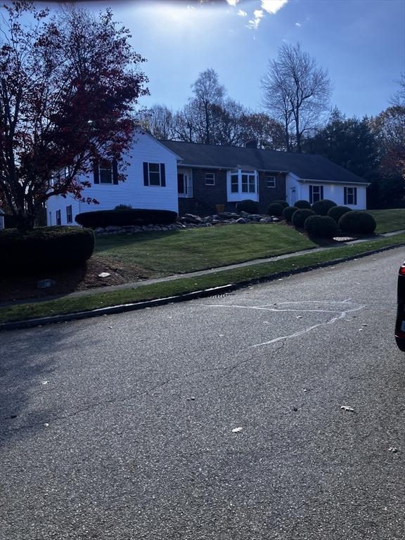 10 Sumac Cir, Holden, MA 01520 - view of front facade featuring a front yard