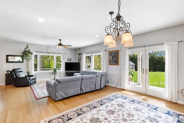 living room with french doors, baseboards, wood finished floors, ceiling fan, and recessed lighting