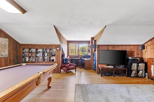 game room featuring wooden walls, wood finished floors, billiards, and vaulted ceiling
