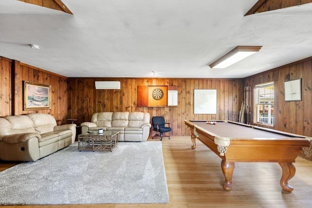 playroom with pool table, wooden walls, and wood finished floors