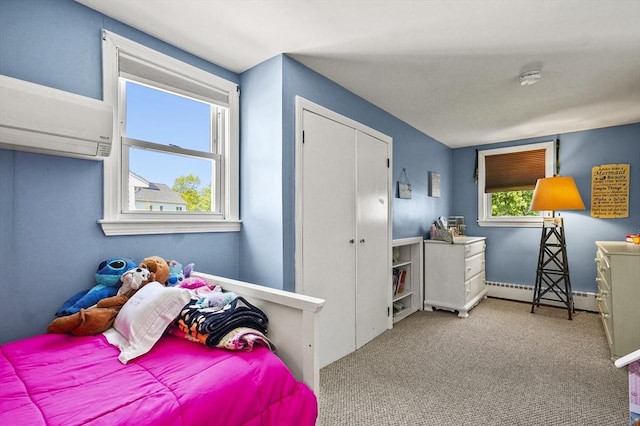 bedroom featuring a baseboard radiator, carpet floors, and an AC wall unit