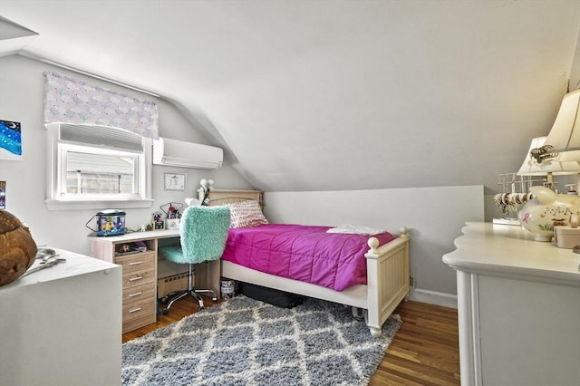 bedroom featuring a wall mounted air conditioner, vaulted ceiling, and wood finished floors