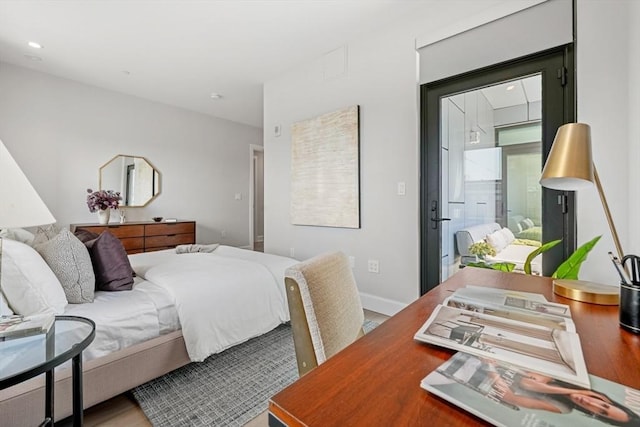 bedroom with recessed lighting and baseboards