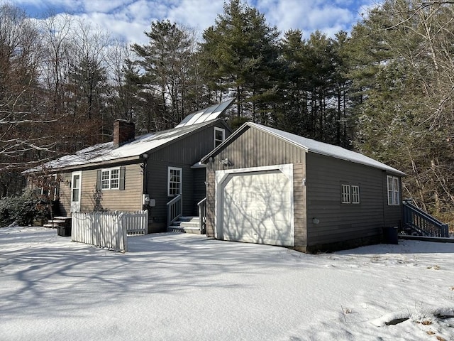 exterior space with a garage