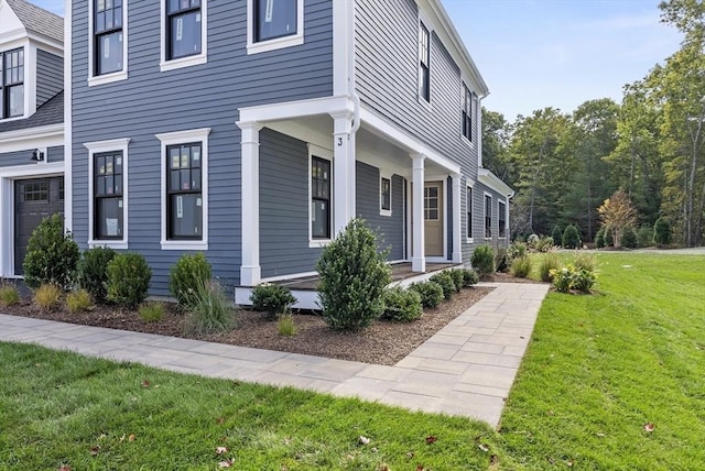 view of home's exterior with a lawn