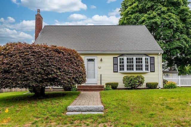 23 Willard St, Dedham, MA 02026 - view of front of home featuring a chimney