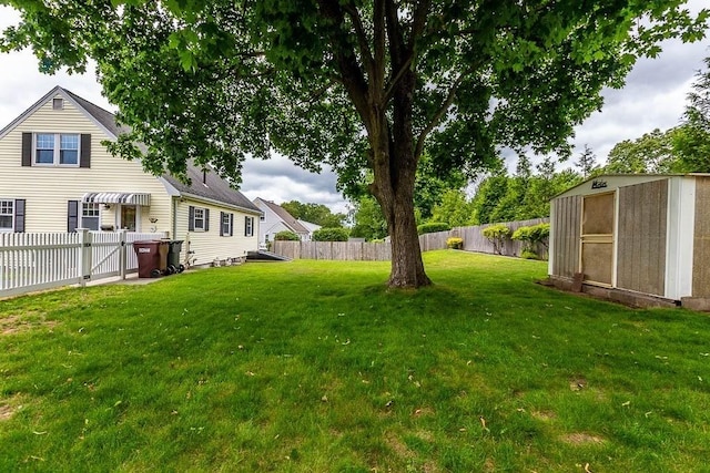 23 Willard St, Dedham, MA 02026 - fenced backyard featuring a shed