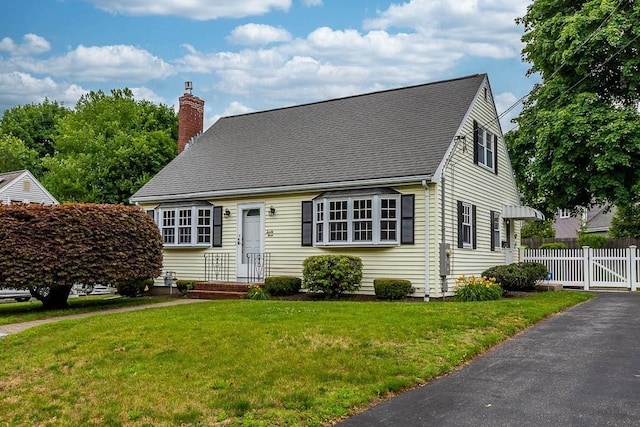 23 Willard St, Dedham, MA 02026 - cape cod house with a chimney