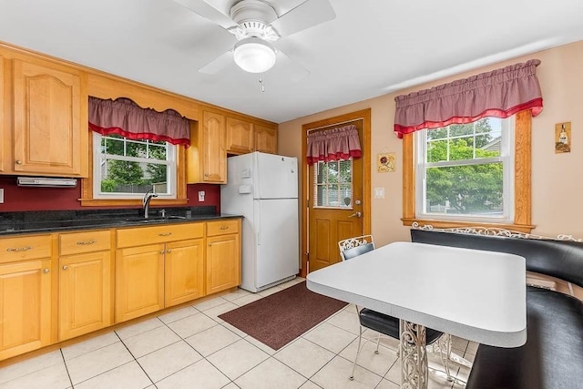 23 Willard St, Dedham, MA 02026 - kitchen featuring freestanding refrigerator, ceiling fan, light tile patterned floors, and dark countertops