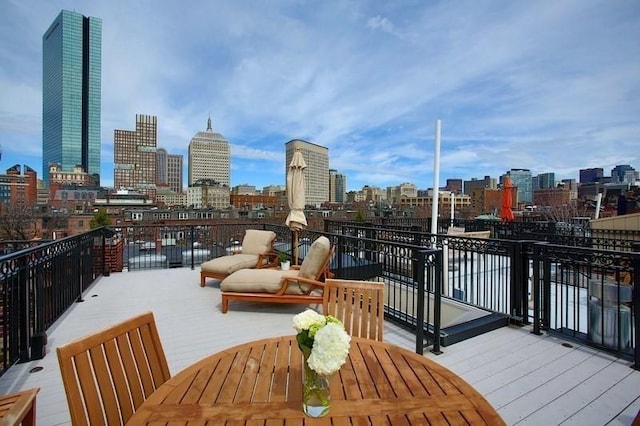 deck featuring a view of city