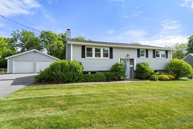 21 Eaton Dr, Hudson, MA 01749 - raised ranch with a chimney, a garage, an outdoor structure, and a front yard