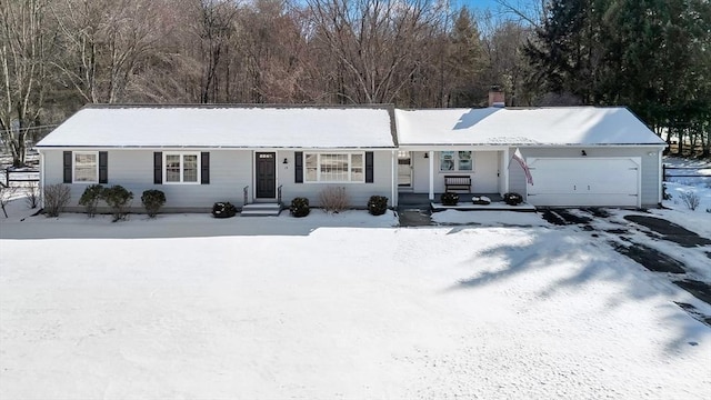 single story home with a garage