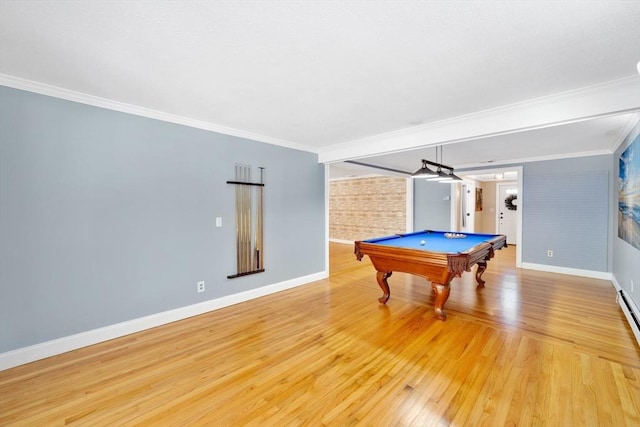 rec room with billiards, ornamental molding, and light wood-type flooring