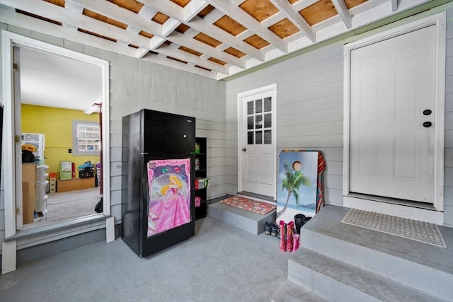 interior space with concrete flooring