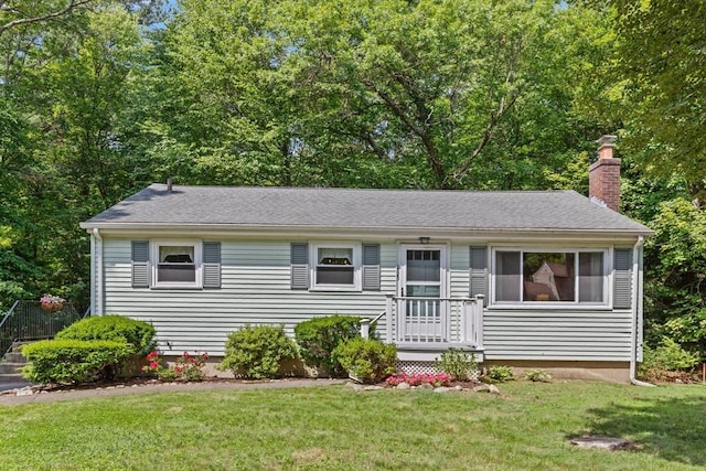 133 Allen Rd, Easton, MA 02356 - view of front of house featuring a chimney and a front lawn
