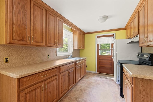 133 Allen Rd, Easton, MA 02356 - kitchen with black range with electric cooktop, under cabinet range hood, tasteful backsplash, brown cabinetry, and crown molding