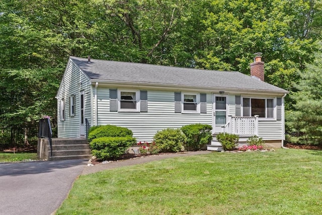 133 Allen Rd, Easton, MA 02356 - view of front of house featuring a chimney, a front lawn, and a shingled roof