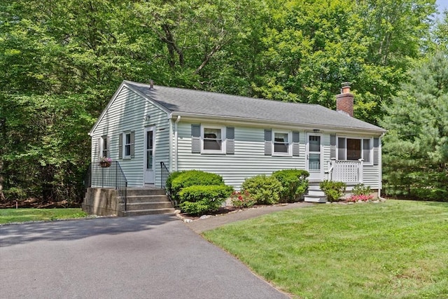 133 Allen Rd, Easton, MA 02356 - view of front of property with a chimney and a front lawn