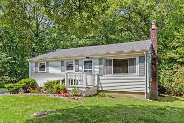 133 Allen Rd, Easton, MA 02356 - view of front of property with a chimney and a front lawn