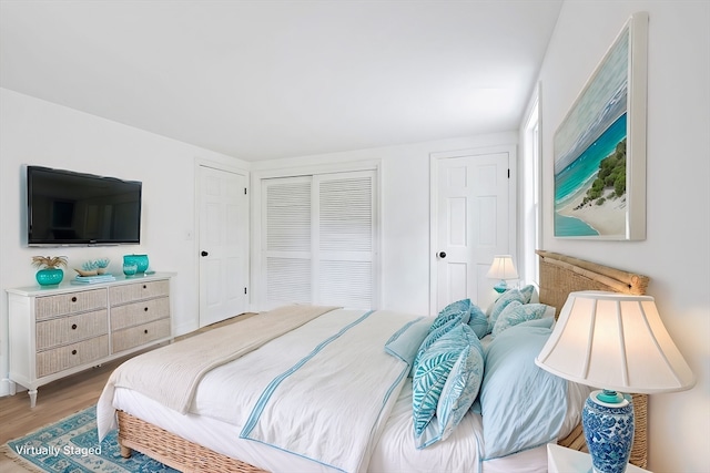 bedroom featuring hardwood / wood-style flooring