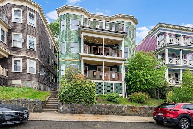 71 Draper St, Boston, MA 02122 - view of front of house with a balcony and stairs