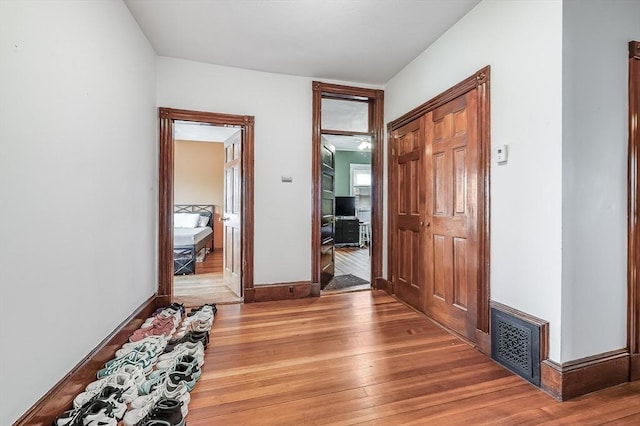 71 Draper St, Boston, MA 02122 - hallway with light wood-type flooring and baseboards