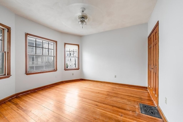 71 Draper St, Boston, MA 02122 - unfurnished room featuring light wood-type flooring and baseboards