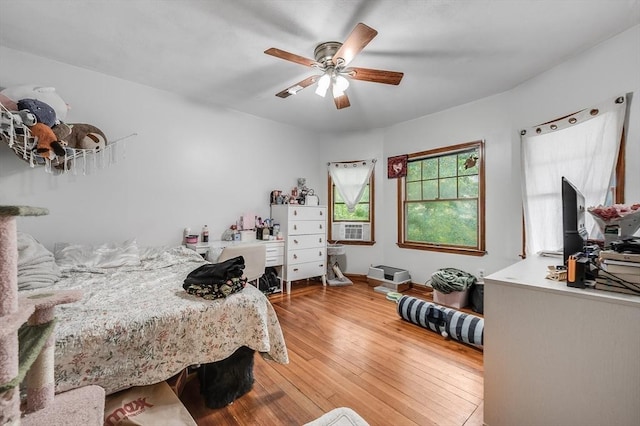 71 Draper St, Boston, MA 02122 - bedroom with light wood-type flooring, a ceiling fan, and cooling unit