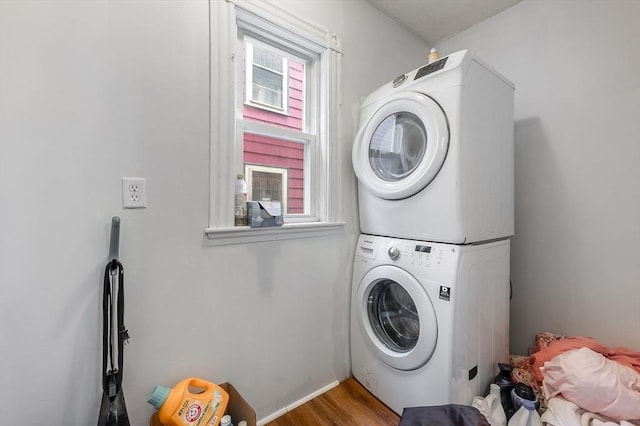 71 Draper St, Boston, MA 02122 - washroom featuring estacked washer and dryer and wood finished floors