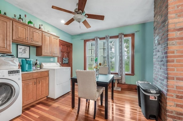 71 Draper St, Boston, MA 02122 - laundry room featuring light wood-style floors, cabinet space, ceiling fan, and separate washer and dryer