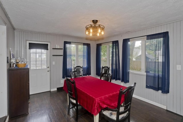 156 Powell, Springfield, MA 01118 - dining area with a textured ceiling, dark wood finished floors, and baseboards