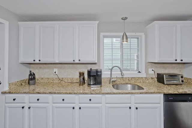 156 Powell, Springfield, MA 01118 - kitchen with stainless steel dishwasher, a sink, white cabinets, and light stone countertops