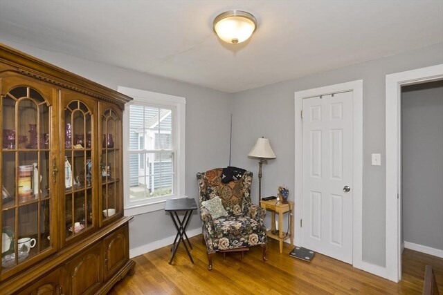 156 Powell, Springfield, MA 01118 - sitting room with wood finished floors and baseboards