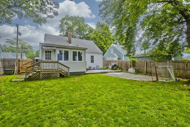 156 Powell, Springfield, MA 01118 - rear view of property with a patio and a chimney