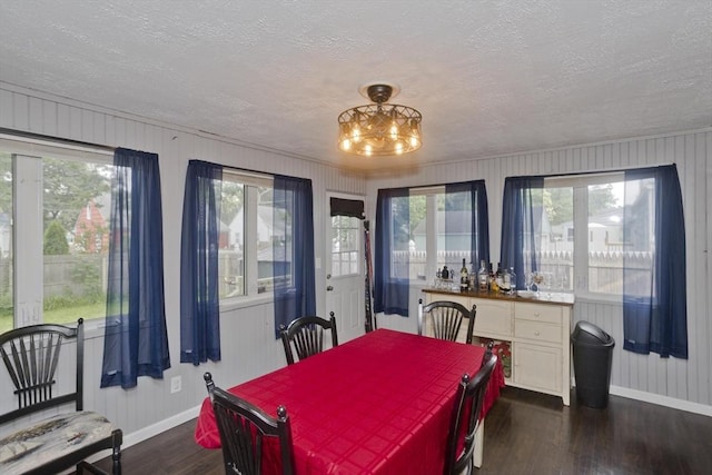 156 Powell, Springfield, MA 01118 - dining area with baseboards, dark wood finished floors, a textured ceiling, and a chandelier